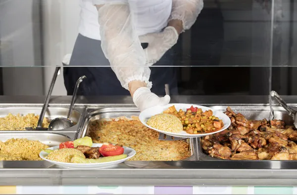 chef standing behind full lunch service station - Food Safety Level 2 Training Course