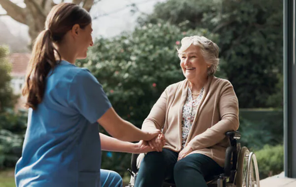holding-hands-nurse-senior-woman-wheelchair-with-help-support-health-wellness enteral feeding - tube care and management